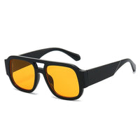 Black frame + orange-yellow lens